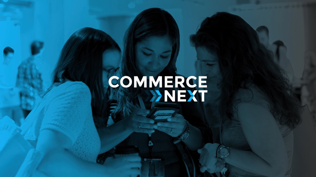 Three people are gathered closely together, looking at something on a mobile device. Text overlay reads "Commerce Next Conference.