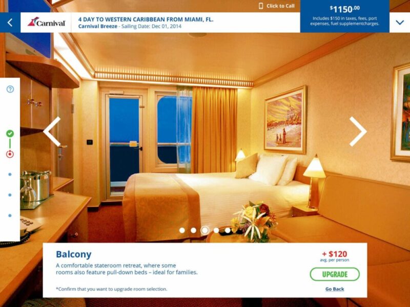 Image of a cruise ship balcony stateroom featuring a large bed, a sofa, a table, a painting, and a sliding glass door leading to the balcony. Pricing details and upgrade option text are displayed.