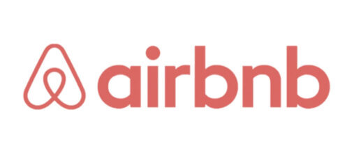 Airbnb logo in red with a stylized "A" symbol on the left, followed by the word "airbnb" in lowercase letters.
