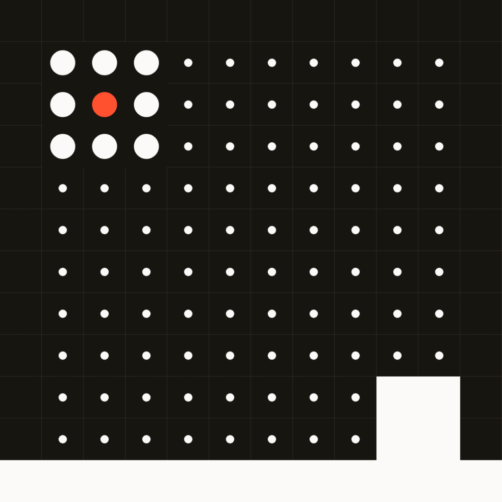 A grid of white dots on a black background with one orange dot in the upper left area; lower right corner has a blank section.