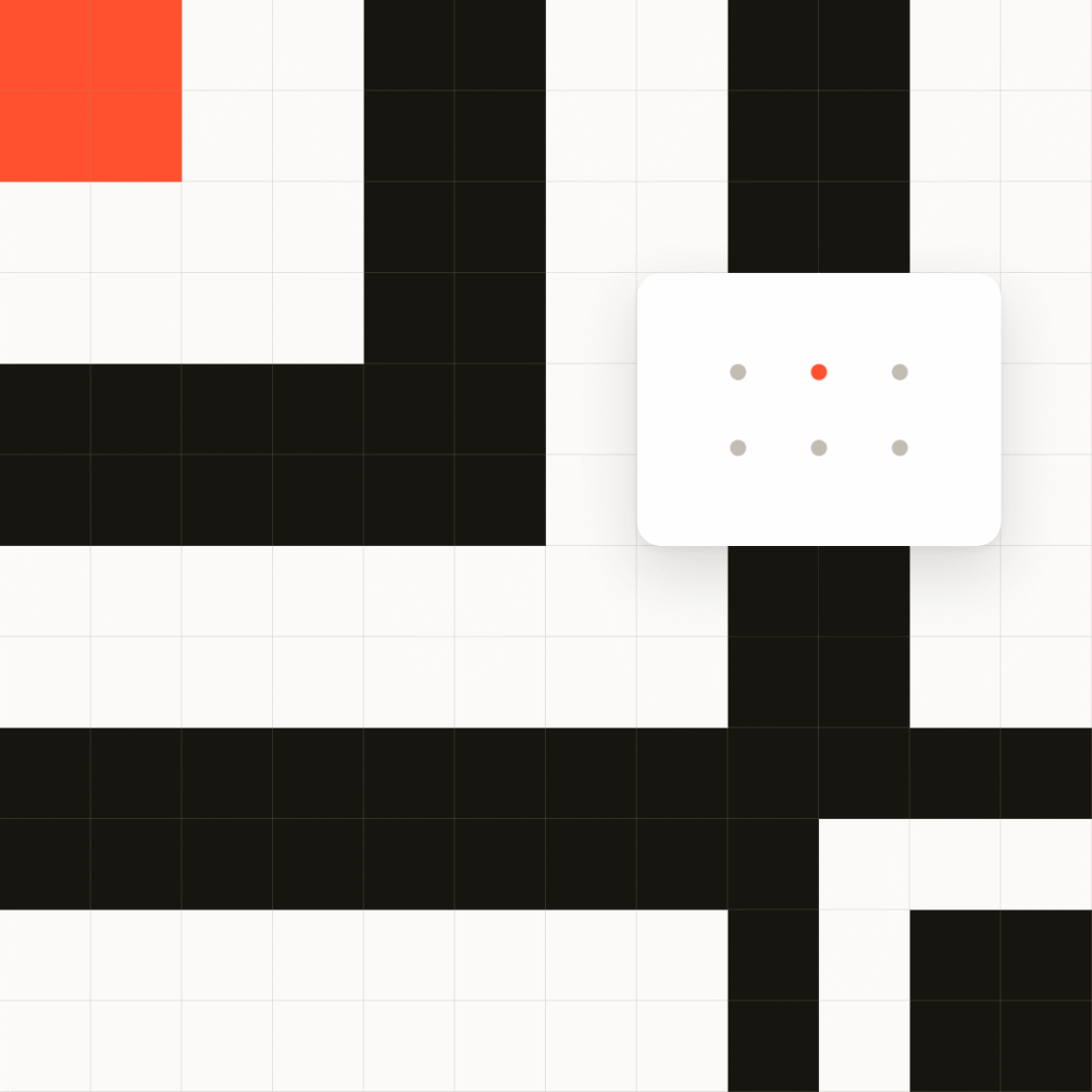 A grid with thick black lines forming right angles, a red square in the top left, and a white rectangle with six small dots, one red, displayed near the center.
